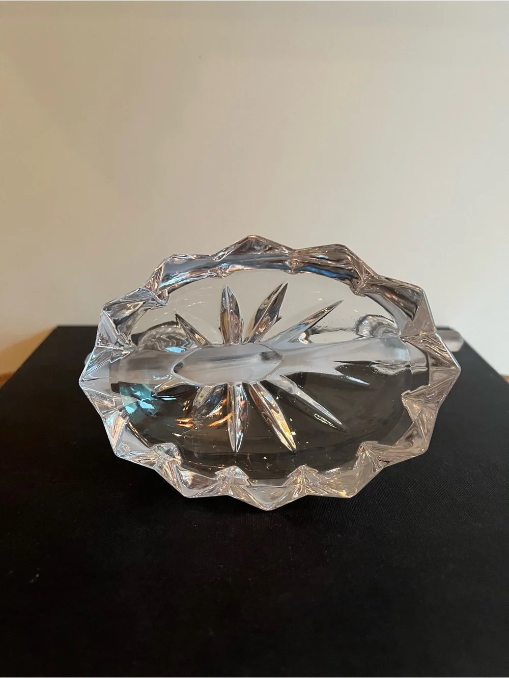 Glass candle holder Features a unique asymmetrical 